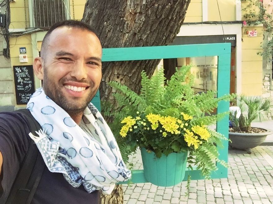 I Install Colorful Flowers In Wooden Frames All Over Cities