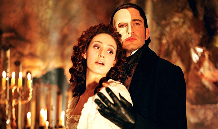 Scene from The Social Network movie featuring characters in dramatic lighting, related to fun facts about movies.