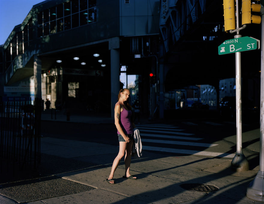Photography of a woman stands on Kensington Ave