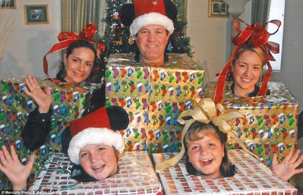 Some People Go All-Out When It Comes To Dressing Up, Like This Family Of Festive Presents
