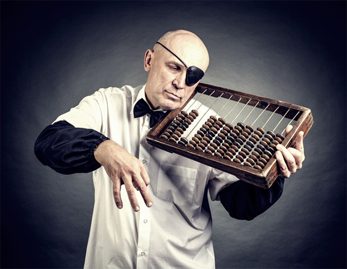 Man in eyepatch pretending to play the violin with an abacus