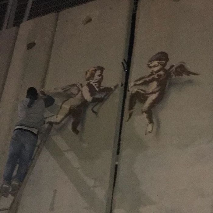 New Banksy Street Art In Palestine Reminds World That The Holidays Aren't Happy For Everyone New Banksy Street Art In Palestine Reminds World That The Holidays Aren't Happy For Everyone