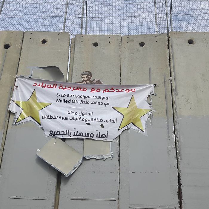 New Banksy Street Art In Palestine Reminds World That The Holidays Aren't Happy For Everyone New Banksy Street Art In Palestine Reminds World That The Holidays Aren't Happy For Everyone