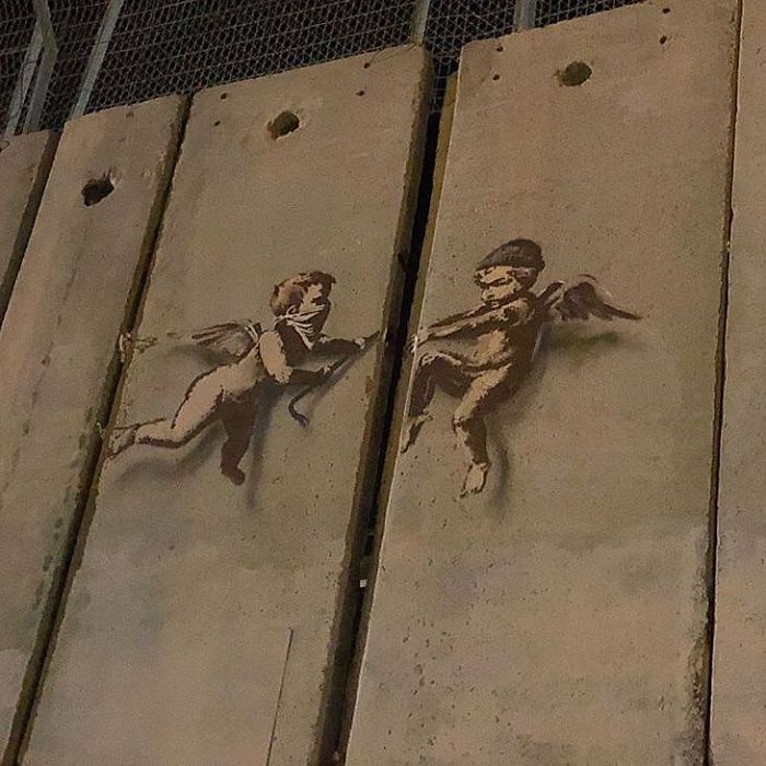 New Banksy Street Art In Palestine Reminds World That The Holidays Aren't Happy For Everyone New Banksy Street Art In Palestine Reminds World That The Holidays Aren't Happy For Everyone