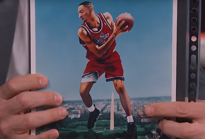 Terry Crews artwork of a basketball player in a red jersey, holding a ball, with the Washington Monument in the background. Terry Crews artwork of a basketball player in a red jersey, holding a ball, with the Washington Monument in the background.