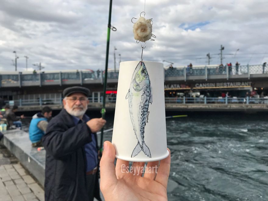 Fisherman Caught The Art On Cup At Galata Bridge.