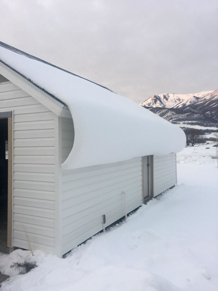 The Snow Coming Off The Roof Of My Garage