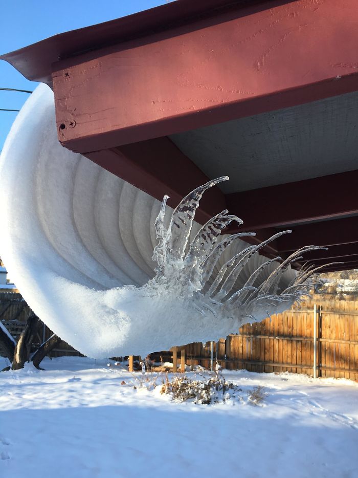 This Crazy Ice Wave Formation From Snow Slowly Melting Off The Tin Roof Of My Patio