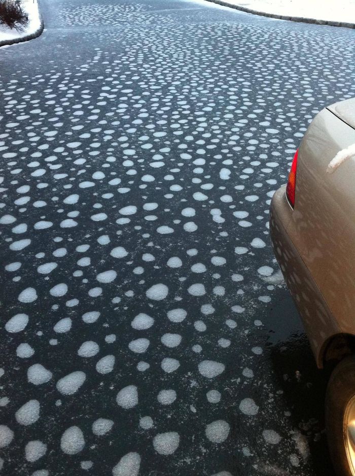 Last Night's Mixture Of Rain And Snow Left A Weird Ice Formation On My Driveway