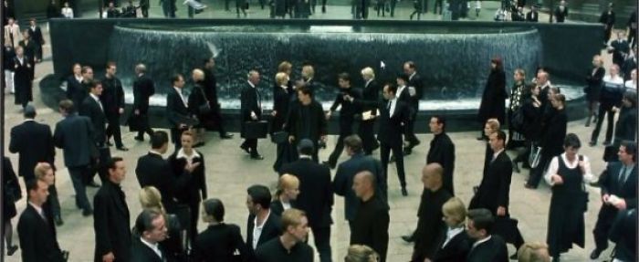 The Matrix Used Multiple Sets Of Twins In The Scene With The Woman In Red To Create The Feeling Of A Copy And Paste World