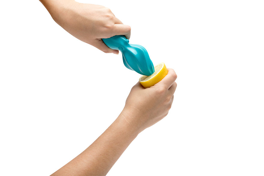 An Adorable Petite Blue Octopus Citrus Reamer That Thrashes Out The Juice With It's Strong Tentacles