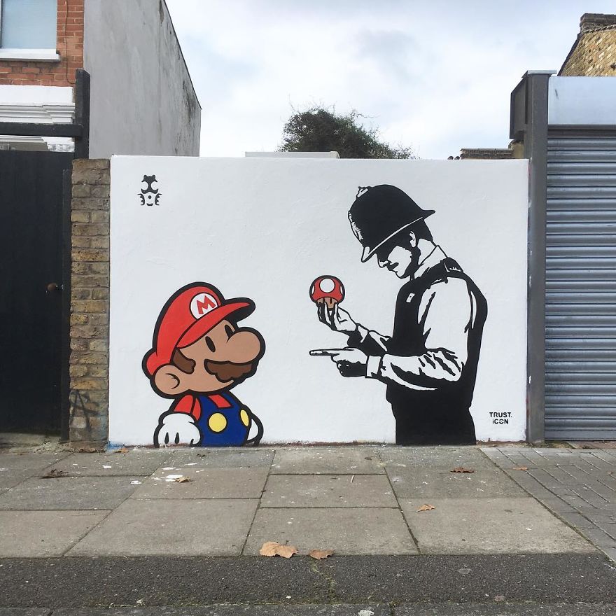 The Street Artist Forces The Viewer To Reflect When Seeing His Artworks On The Walls The Street Artist Forces The Viewer To Reflect When Seeing His Artworks On The Walls