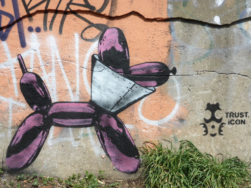 The Street Artist Forces The Viewer To Reflect When Seeing His Artworks On The Walls The Street Artist Forces The Viewer To Reflect When Seeing His Artworks On The Walls