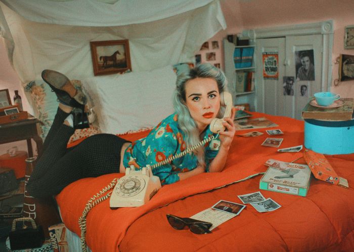 I Created ‘The Evolution Of Bedrooms’ By Rearranging My Parents Guest Room And Only Using Objects Found In Their House