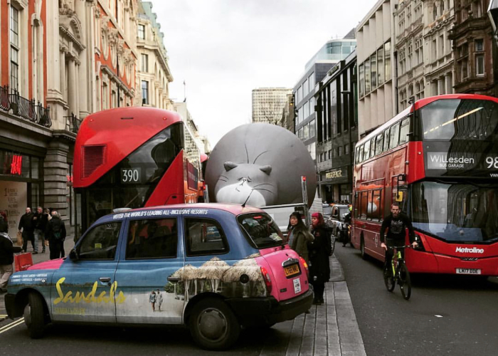Five Huge, Inflatable Fat Cats Prowl Around London To Encourage People To Send A Message To The Banks