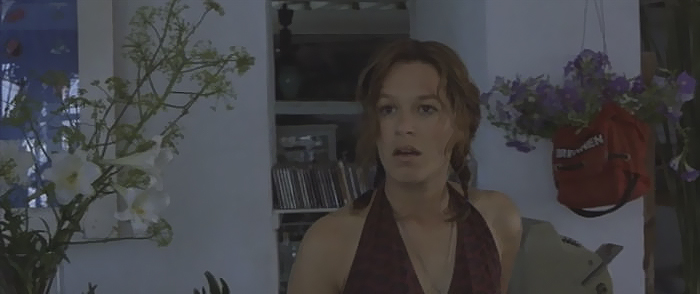 In Bourne Identity(2002) When Jason Finds Marie In Her Scooter Shop She Has Turned The Bank Bag He Gave Her Into A Flower Holder