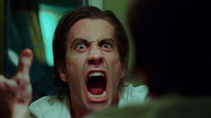 Close-up of intense character yelling in a dramatic scene from Nightcrawler, featured in fun facts about movies.