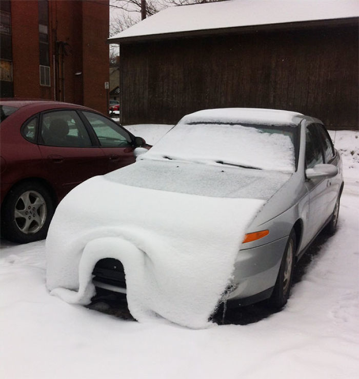 The Snow Fell Off Of This Car And Looks Like A Blanket