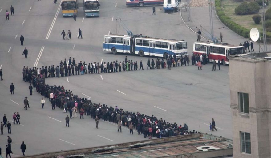 A line of people to sit in the trolleybus 