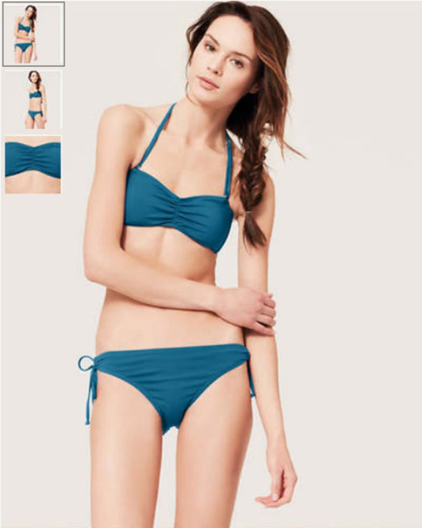 Model wearing a blue bikini posing for a photoshoot showcasing swimwear highlighting Photoshop fails in fashion images.