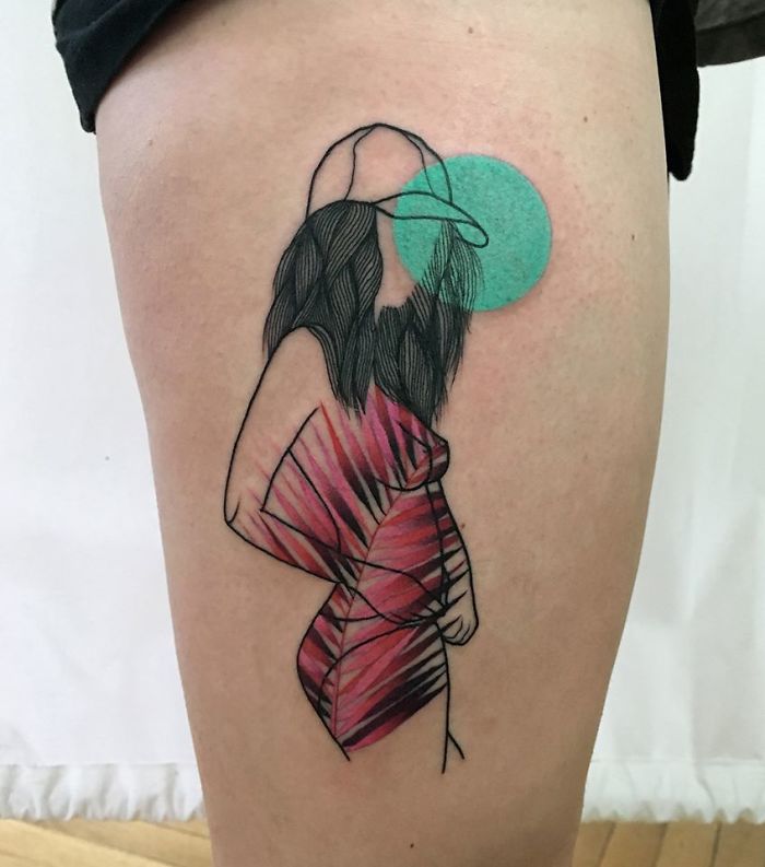 Tattoo of a woman in a pink dress and cap, featuring nature-themed abstract art.