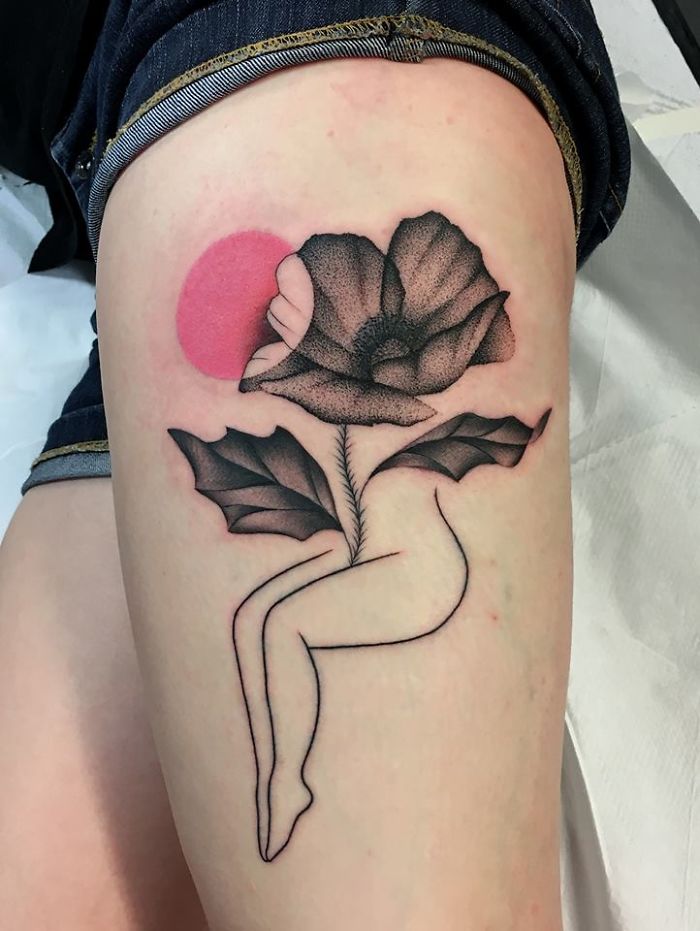 Tattoo depicting the relationship between nature and humans with a flower and human form on a leg.
