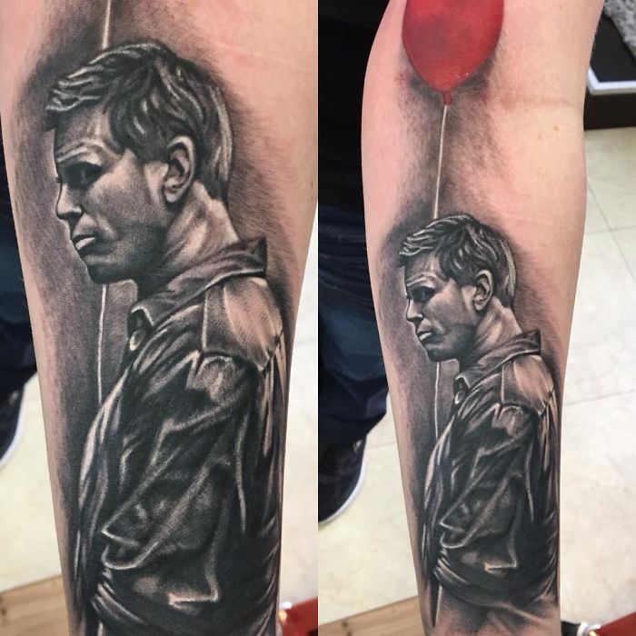 Tattoo of a reflective man holding a red balloon, symbolizing a personal story.