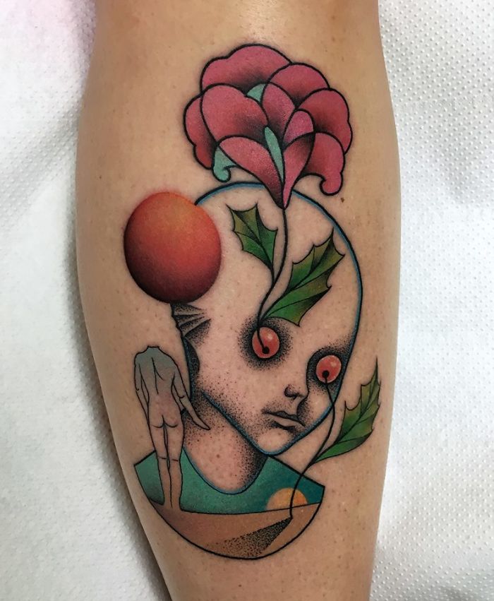 Colorful tattoo depicting nature and human elements with abstract face, leaves, and flowers on skin.