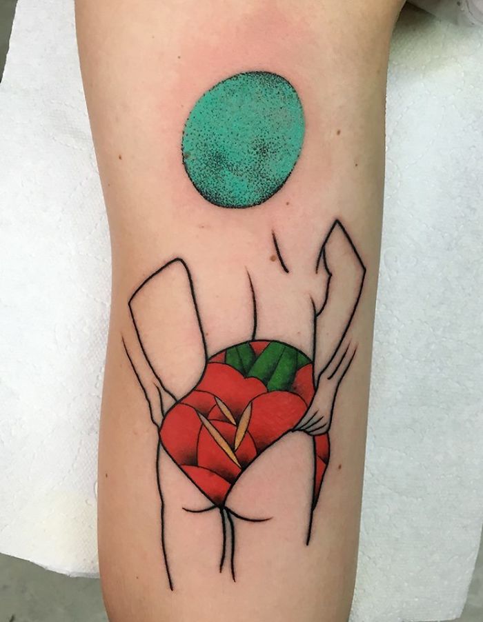 Tattoo depicting the relationship between nature and humans with abstract design and vibrant colors.