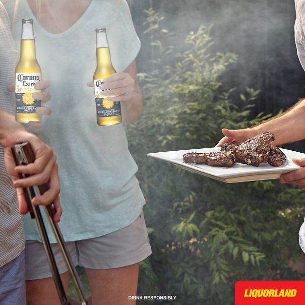 People holding beers and grilled steaks during an outdoor barbecue with visible Photoshop fails in the image.