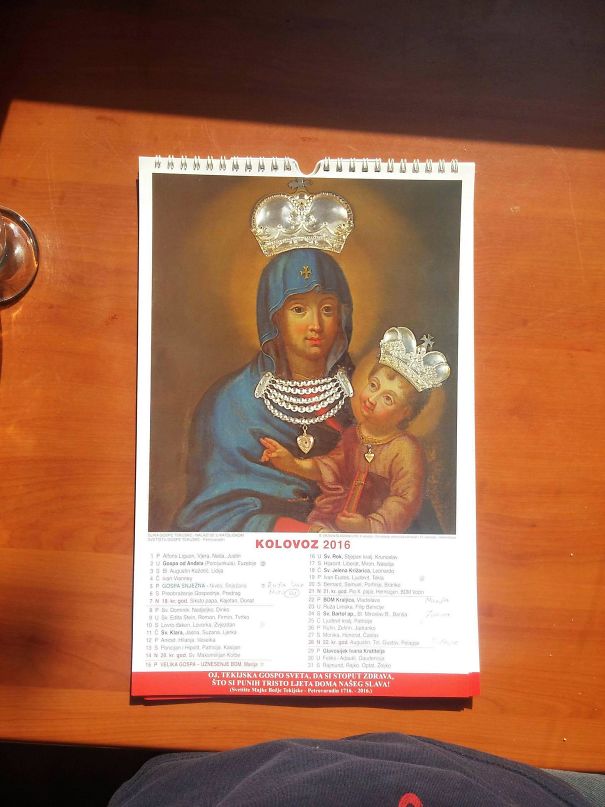 Religious calendar page showing a historic image with crowns added, illustrating a Photoshop fail for humor.