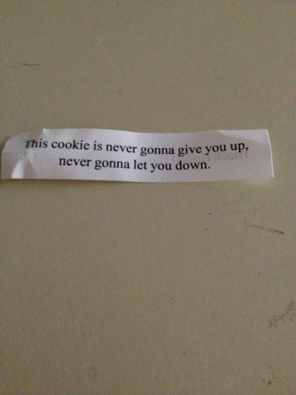 Sassy fortune cookie saying on a table, referencing a popular song lyric in a playful twist.