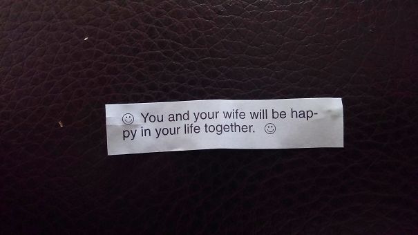 Fortune cookie message predicting happiness for a married couple, with a sassy tone.