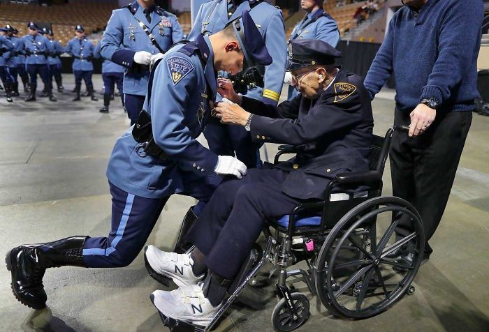 Retired Pittsfield Police Officer Enrico Giardina, 91, Pins A Badge On His Grandson, Adam Simeone, At Massachusetts State Police Graduation