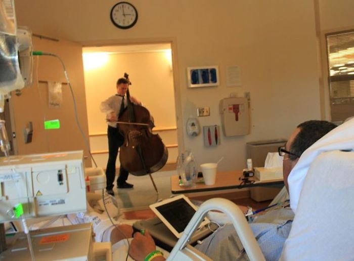This Guy Went Door-To-Door At A Local Cancer Treatment Center, Playing For Those Working Towards Recovery