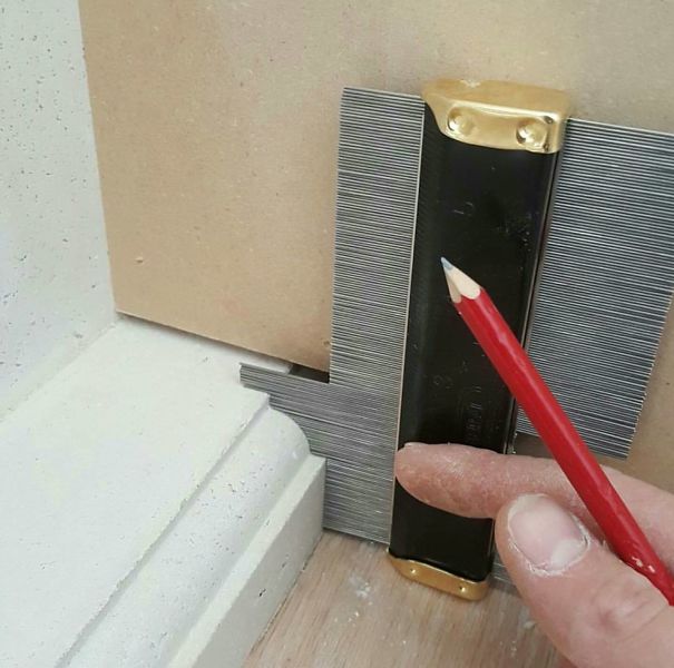 This Carpentry Tool With Pins To Outline A Shape