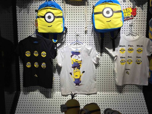 Both The White And Black T-Shirt Has The Same Design With Black Text