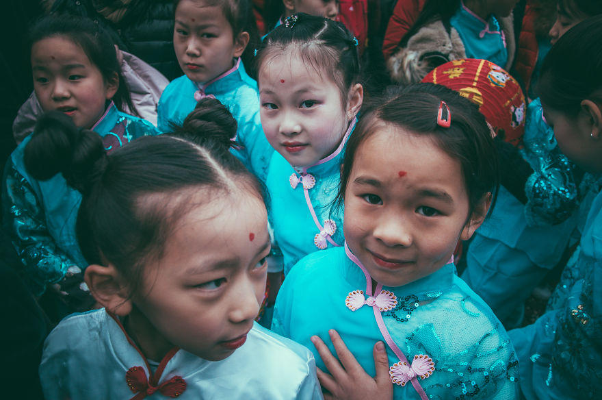 Photographer Enters The Parade Without Permission To Capture Portraits During Chinese Spring Festival In Milan