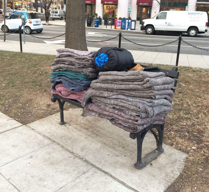 A City Worker Washes And Folds These Blankets For The Homeless