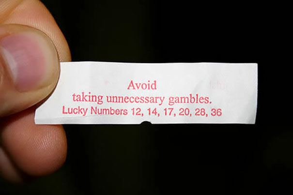 Fortune cookie saying: "Avoid taking unnecessary gambles." Lucky numbers displayed.