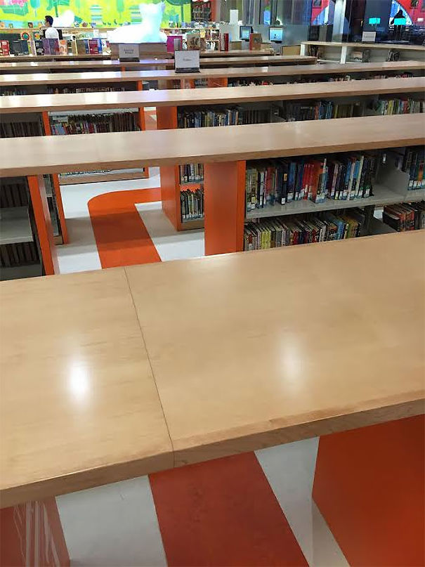The Shelves In The Boston Public Library's Children Section Have Gaps For Children To Walk Through
