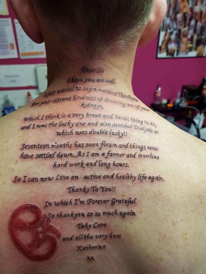 Tattoo of a gratitude letter for a kidney donation on a person's back, illustrating a personal story behind tattoos.