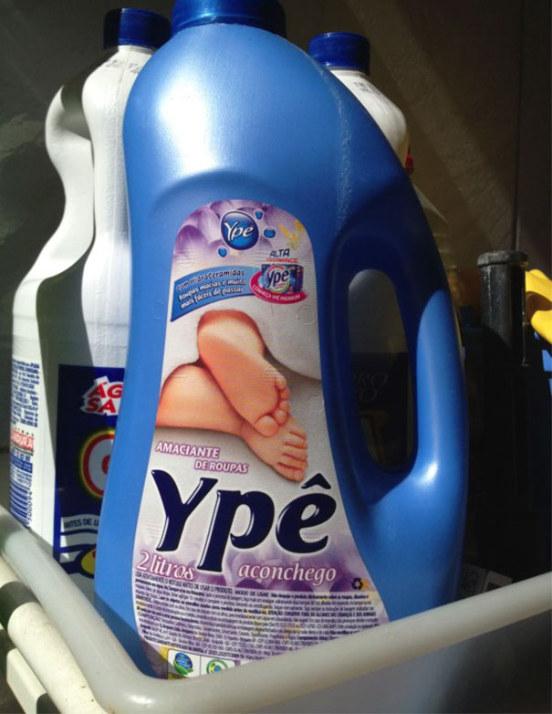 Laundry detergent bottle with a Photoshop fail showing feet instead of fabric for a hilarious and disastrous effect.