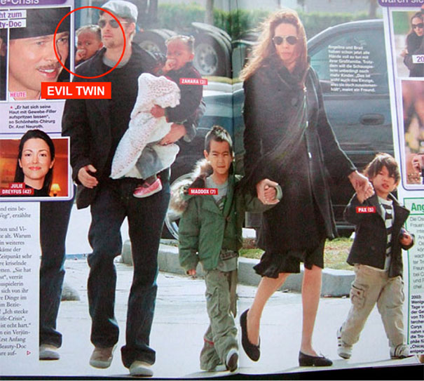 Photoshop fail showing a man holding two children with an extra face duplicated behind him in a magazine spread.