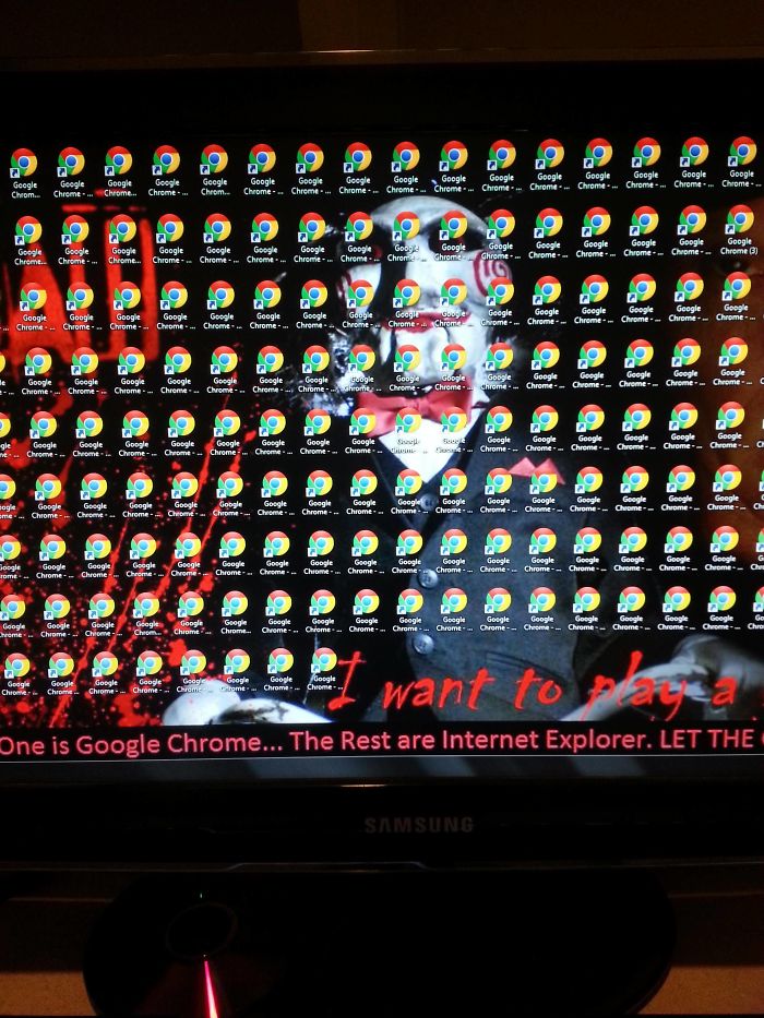 Genius desktop wallpaper filled with Chrome icons revealing a message in red text.