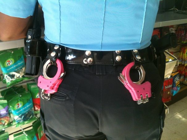 I Was At 7 Eleven And Saw This Female Police Officer With Her Pink Handcuffs. I Asked If I Could Take A Photo, And She Said Yes And Also Explained They Have Other Colors Such As Light Blue, Purple, Yellow. She Said She Loves Putting The Pink Cuffs On The Guys