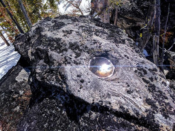 This Puddle Reflecting The Sun Looks Like A Portal To Space