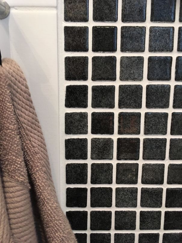 This Wall In My Bathroom Creates The Gray Dot Illusion