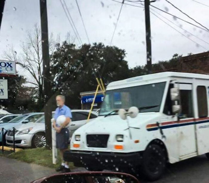 Patriotic Postman Shows Respect In The Rain For A Funeral Motorcade That Was For A Wwii Veteran