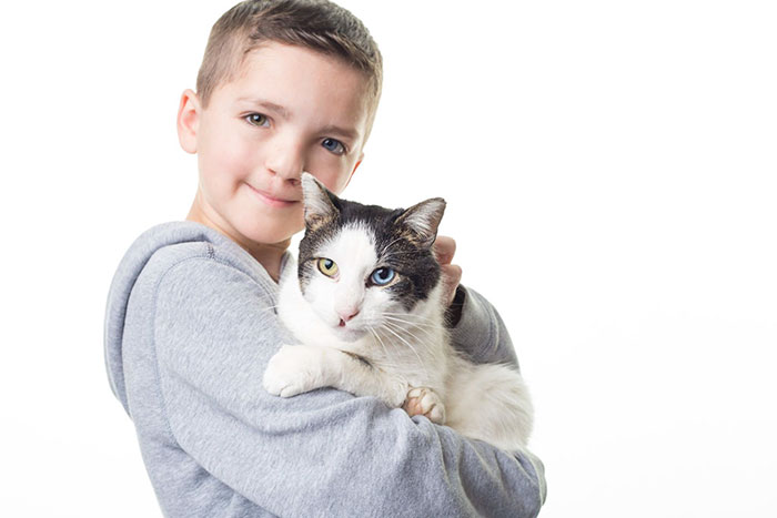 Bullied 7 Year-Old Finds Cat With Same Rare Eye Condition And Cleft Lip, And It's Like Destiny Exists